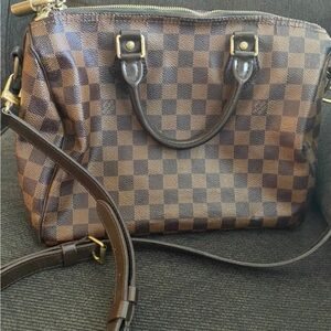Auth. LV Bandouliere speedy.